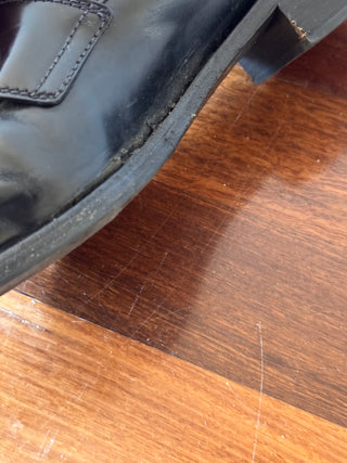 Prada Black Logo Plaque Leather Loafers